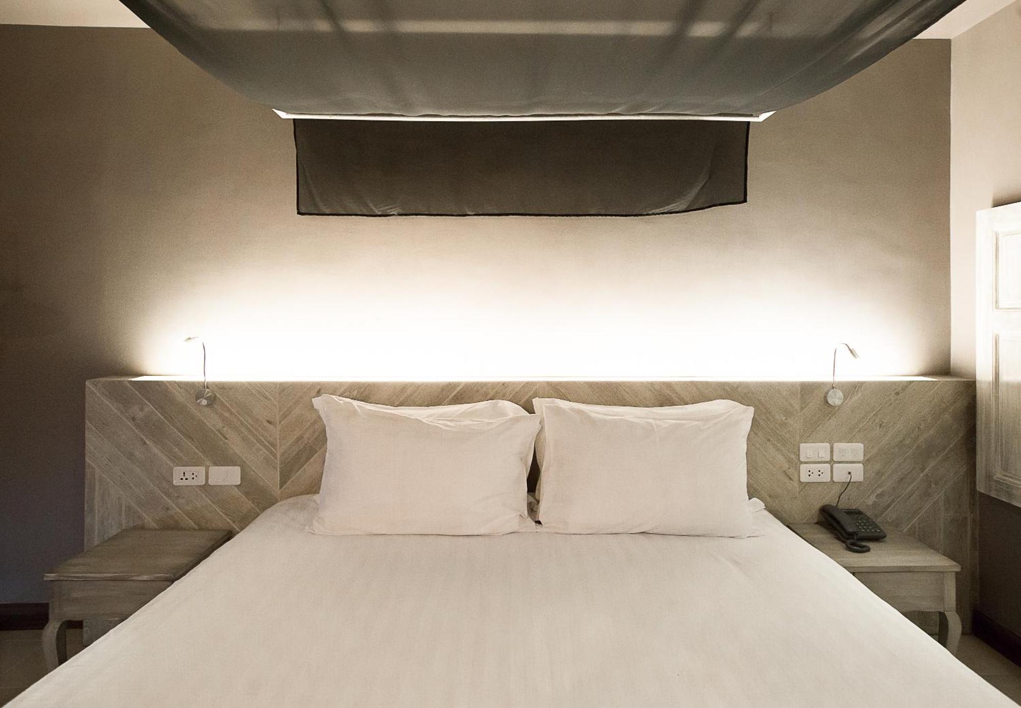 Art Mai Gallery Nimman Hotel Čiang Mai Exteriér fotografie A bed